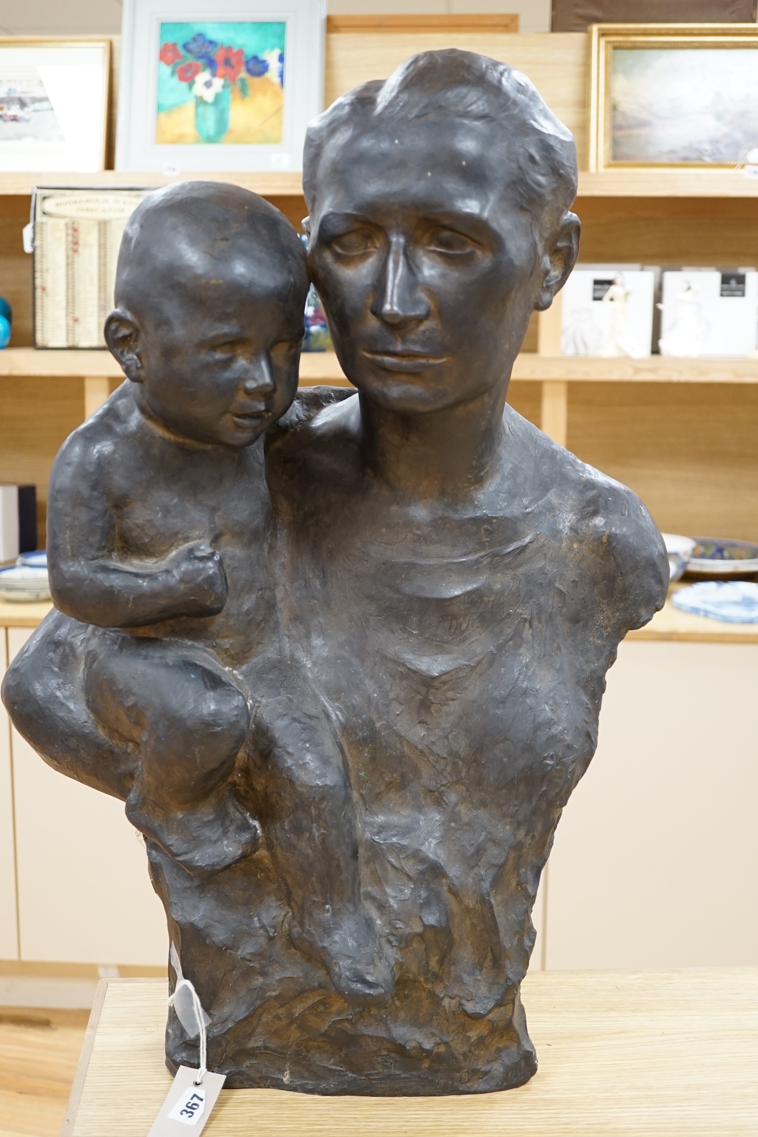 Turi Weinmann (German 1883-1950), a life size bronze bust of a mother and child, 73cm high. Condition - good